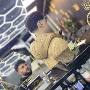 Portrait of Barber Rashed
